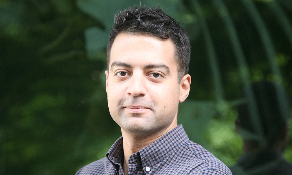 image of man in button up shirt and short hair