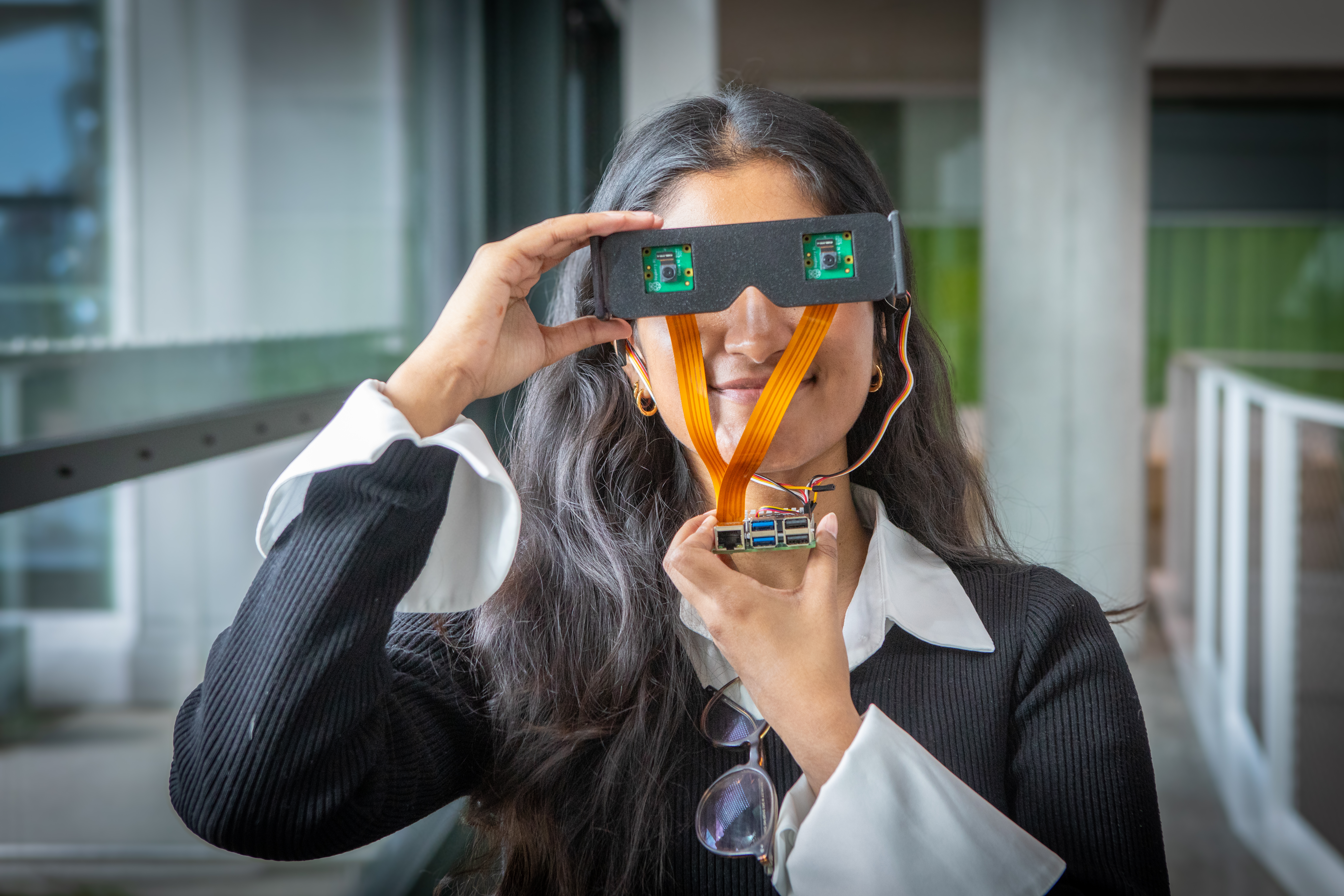 Harvard SEAS student Elsa Oreen wearing a pair of smart glasses