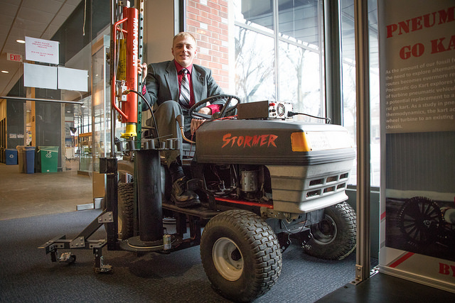 Harvard SEAS alum Rico Stormer riding a small tractor