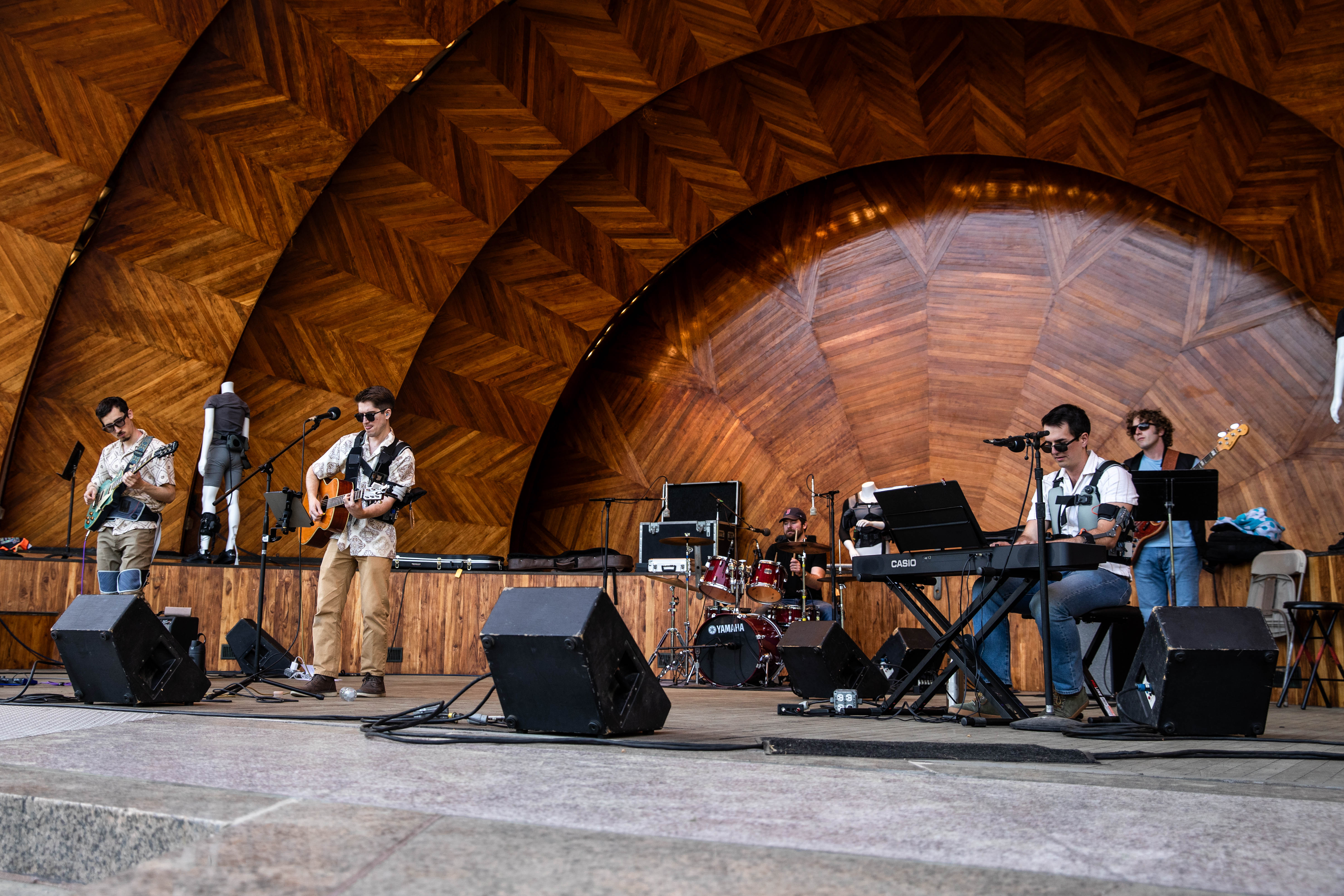 A group of Harvard SEAS students performing at the Hatch Memorial Shell in Boston