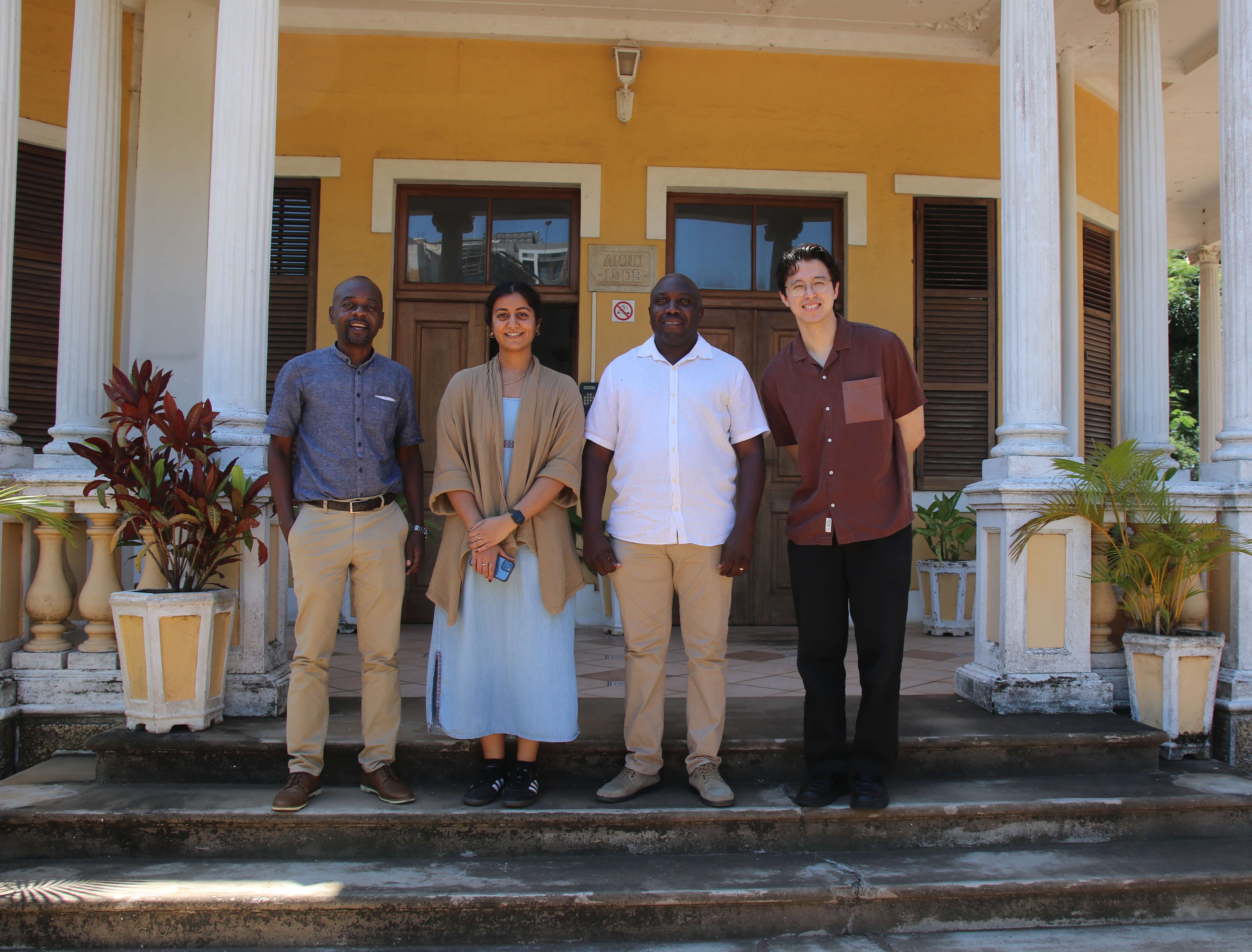 Harvard SEAS GSD alums Mitul Iyengar and Luke Fiorante with meteorologists in Mozambique