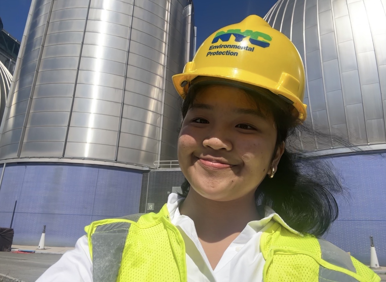 Harvard SEAS student Aryenne Ysabelle Rodrigo wearing a yellow New York City Environmental Protection Department helmet