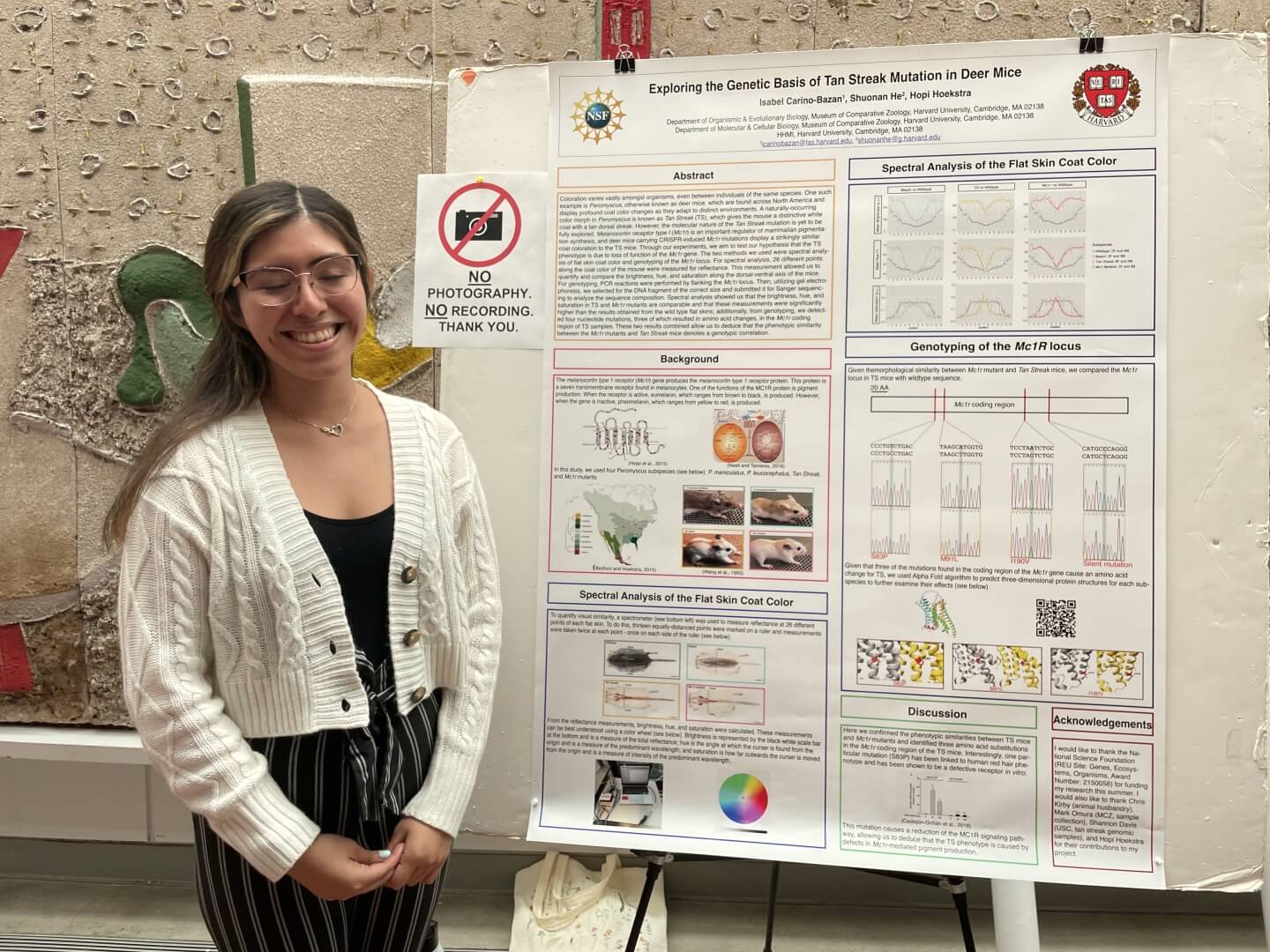 Isabel Carino-Bazan, a rising sophomore molecular biology and economics student at Lehigh University, with his REU research poster