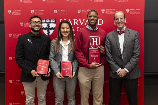 David Andrade, Grace Kim and Jonathan Collins with SEAS Dean Frank Doyle