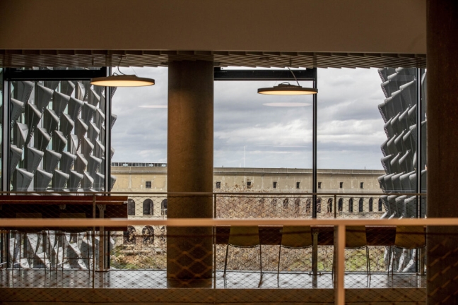The grand Harvard Stadium is visible between the grids of the SEC. One historic and one new, both buildings are landmarks of Harvard's Allston presence. 