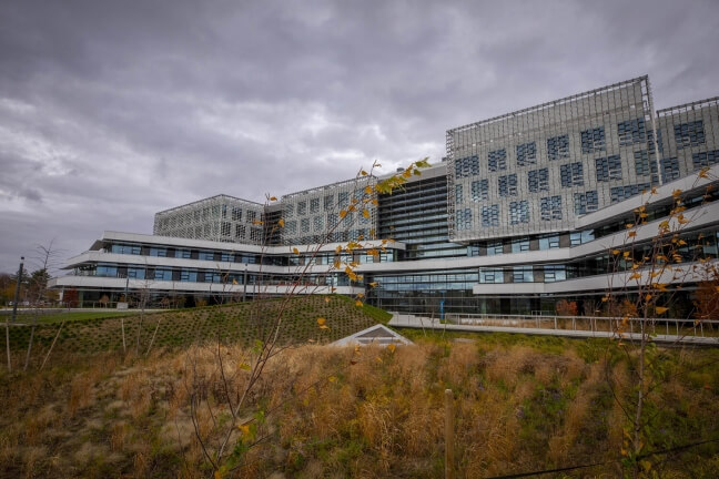 The SEC building spans 500,000 square feet and is covered by an energy-efficient grid structure on the outside. 