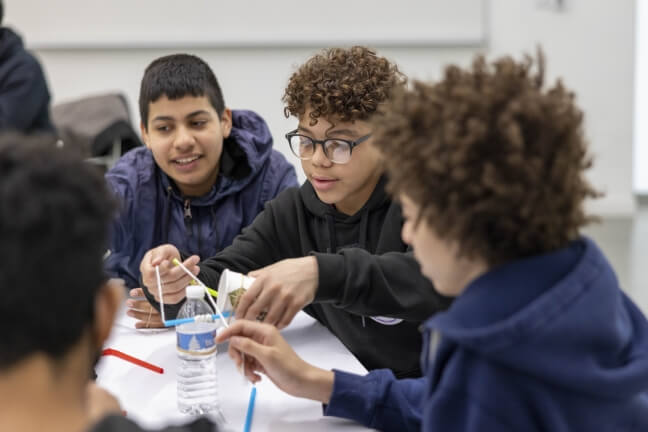 Boston Public School students work on a project