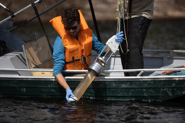 Evan Routhier during sediment collection