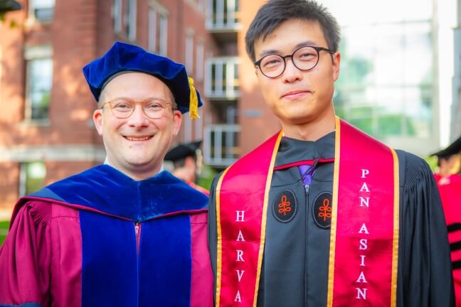 Harvard SEAS Dean David Parkes and student Kehang Zhu