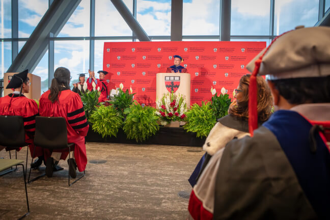 Dean Parkes hooding commencement 2026