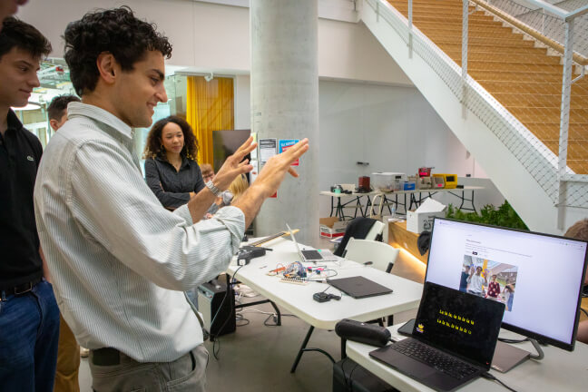 Harvard student Said El Kadi playing music using a computer's camera vision