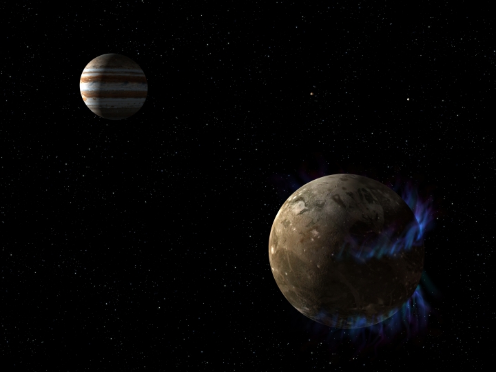 An illustration of the moon Ganymede orbiting Jupiter. 