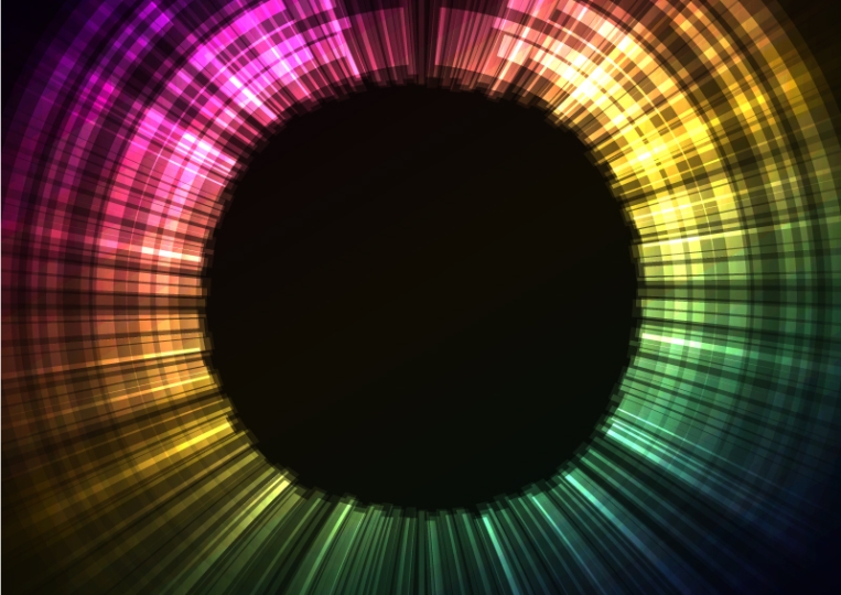 image of a rainbow of light around a dark circle