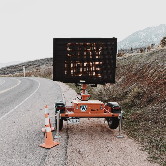 picture of a stay at home sign