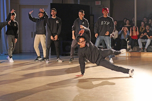 Malate performs with the Harvard Breakers, the University’s student break dancing organization.
