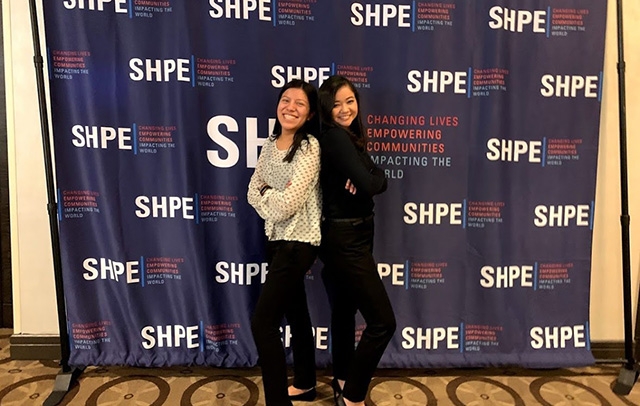 Villafuerte (right) and Harvard Society of Hispanic Engineers (SHPE) outreach co-chair Araceli Marcial at the SHPE annual meeting.