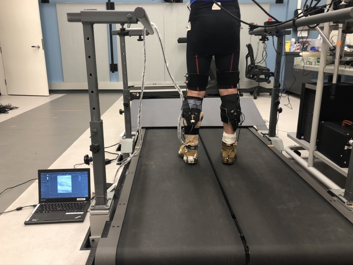 image of person on treadmill with exosuit