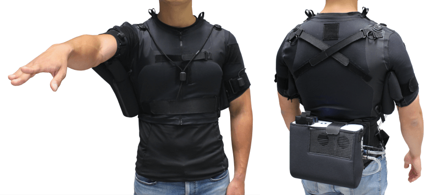 Two torsos wearing a black soft robotics vest. The first figure is able to raise their right arm with the help of the wearable. The second figure shows the technology box equipped at their lower back.