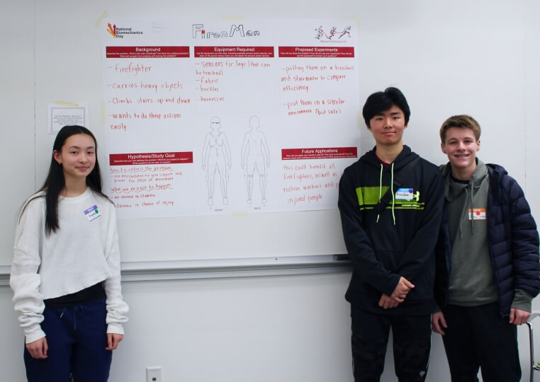 High school students present their poster at Biomechanics Outreach Day at the Science and Engineering Complex