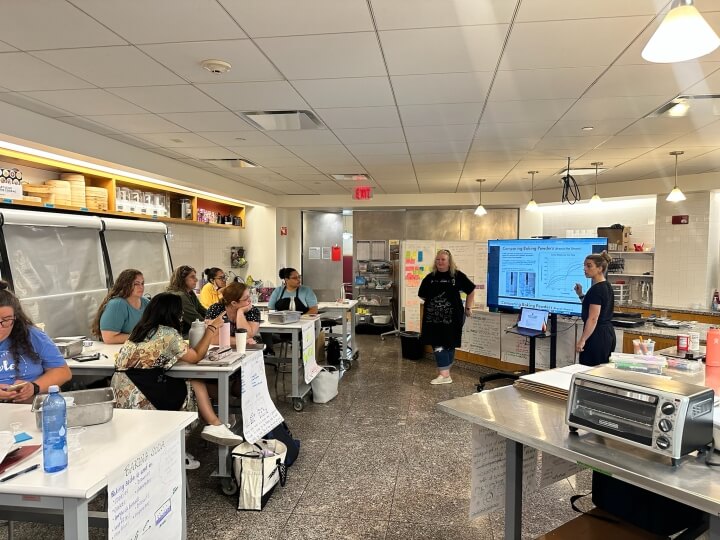 Harvard alum Kate Strangfeld and teacher Shawn Boggs lead a workshop