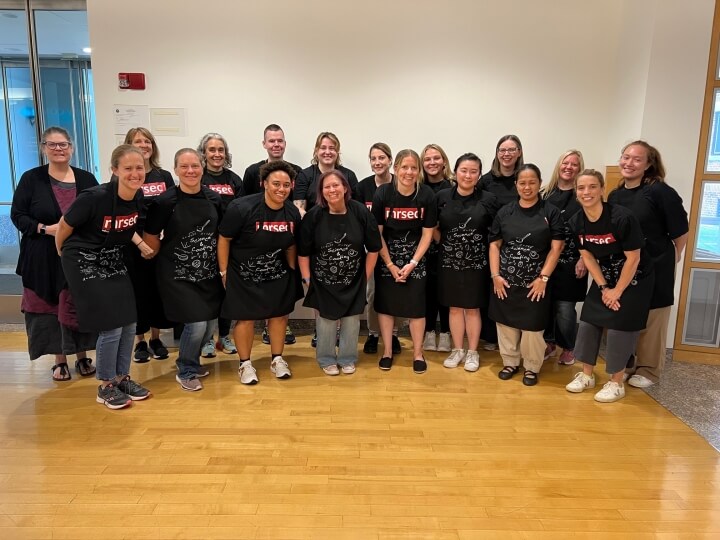 A group of high school teachers and Harvard SEAS administrator Kathryn Hollar