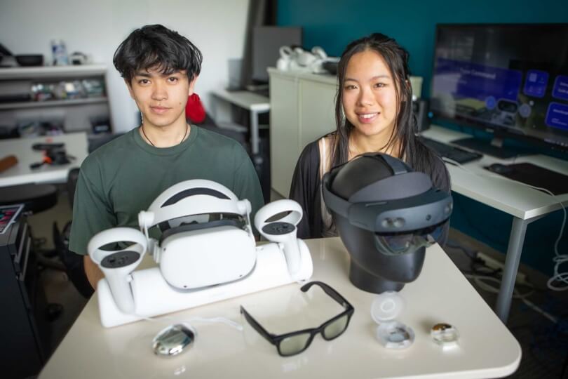 Harvard SEAS students AnhPhu Nguyen and Alice Cai with augmented reality headsets and smart glasses