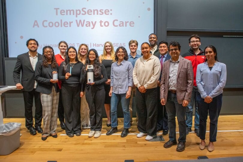 A group of male and female Harvard SEAS students and faculty