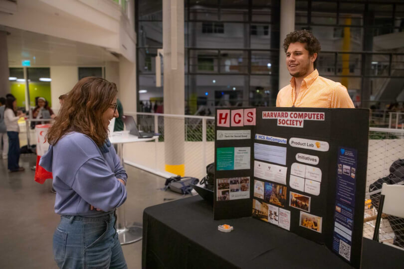 Harvard SEAS students at a Convocation display for the Harvard Computer Society