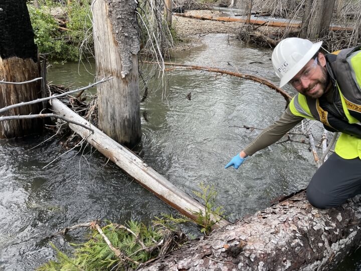 Harvard SEAS alumnus Nick Waldo, A.B. '13, at a cleanup site in Washington
