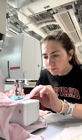 Harvard SEAS GSD alum Sara Falkson at a sewing machine