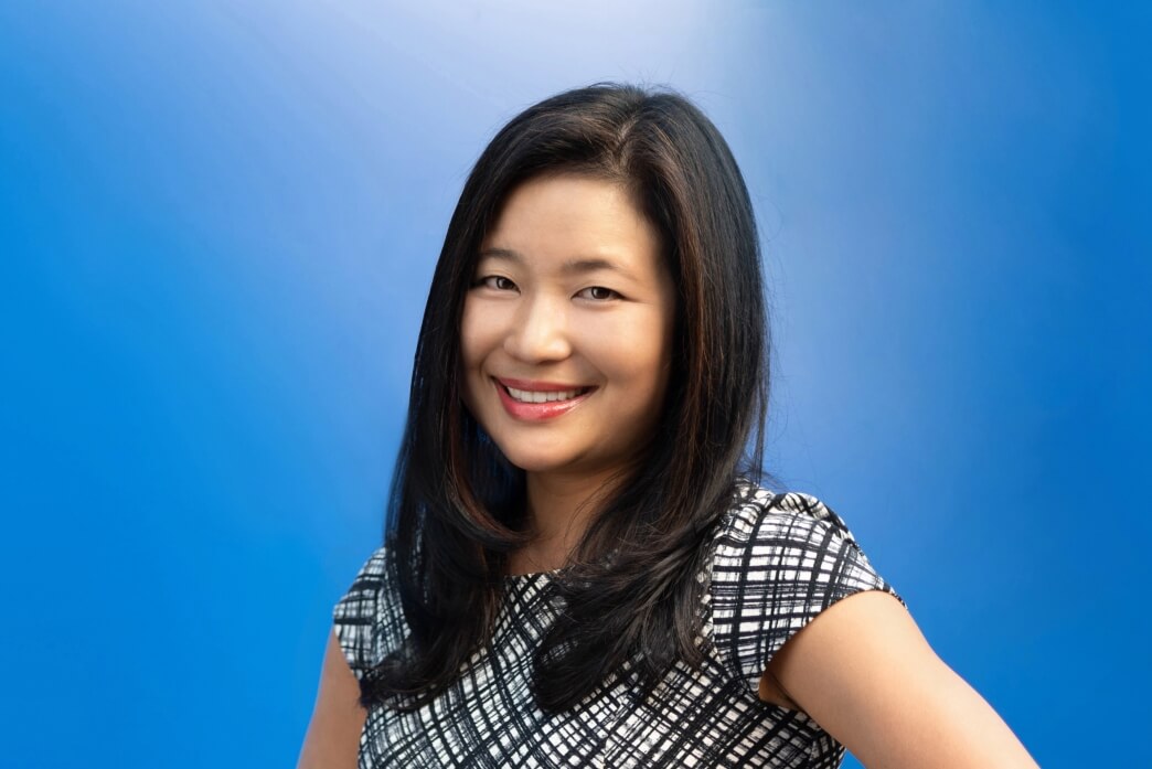 Picture of Harvard SEAS alum Kyoko Crawford, S.B. '04, wearing a black and white dress