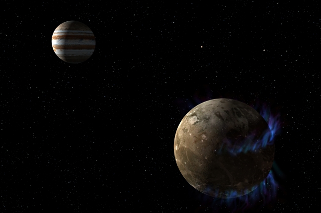 An illustration of the moon Ganymede orbiting Jupiter. 