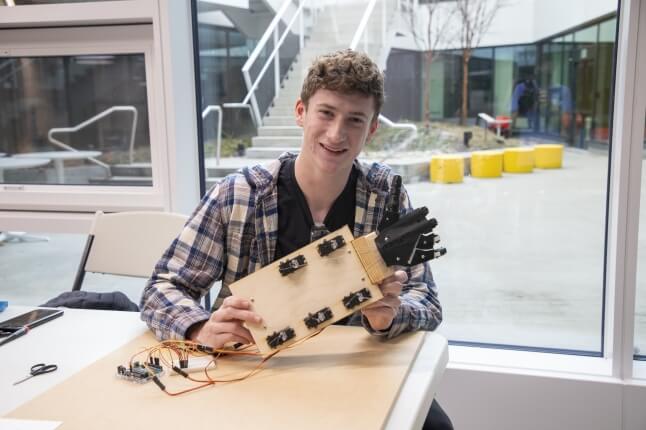 Connor Carriger with his robot hand