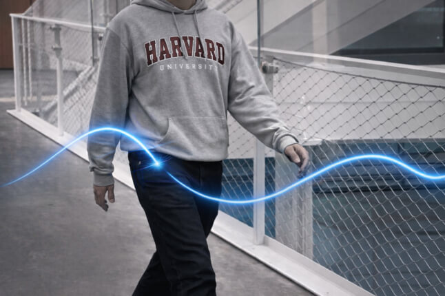 person walking with a superimposed wave graphic 