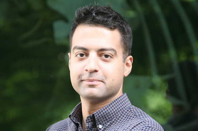 image of man in button up shirt and short hair