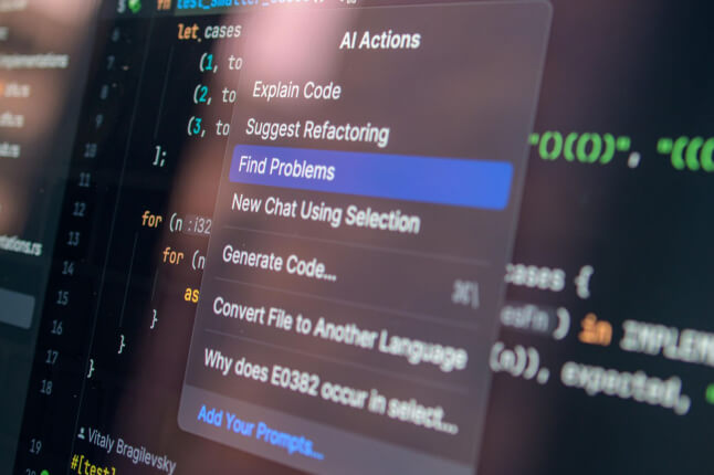 Close-up of a computer screen showing source code with an “AI Actions” context menu open, highlighting options such as “Explain Code,” “Suggest Refactoring,” and “Find Problems,” illustrating AI-assisted programming tools