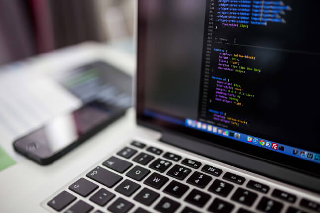 coding on a laptop
