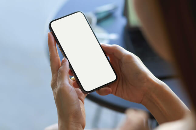 person looking at a smartphone screen