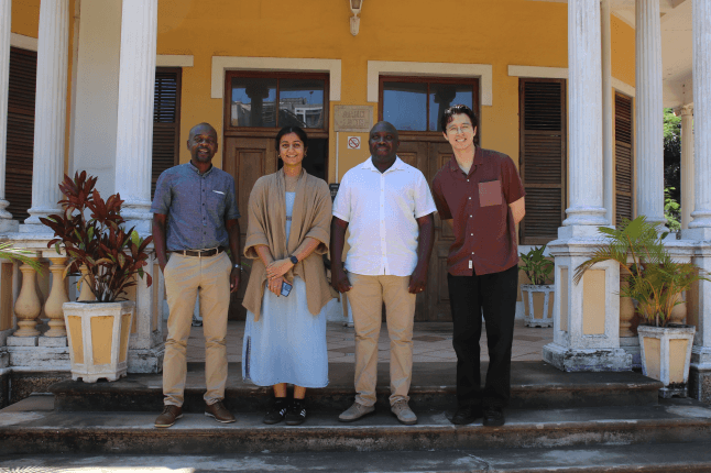 Harvard SEAS GSD alums Mitul Iyengar and Luke Fiorante with meteorologists in Mozambique