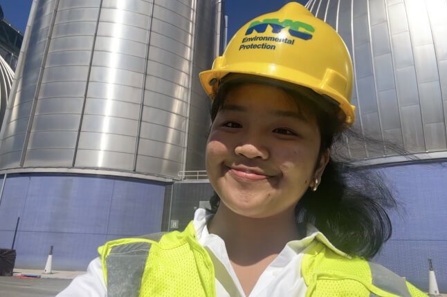 Harvard SEAS student Aryenne Ysabelle Rodrigo wearing a yellow New York City Environmental Protection Department helmet