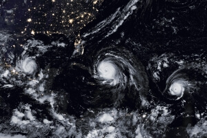 satellite image of three hurricanes