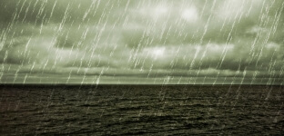 image of rain over the ocean