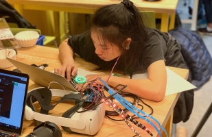 Alice Cai assembles a piece of the Nervous Network