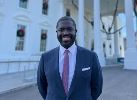 Harvard SEAS student Nana Menya Ayensu, S.B. '07, in front of the White House