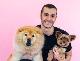 Harvard SEAS alum Marc Atiyeh, A.B. '14, with two dogs