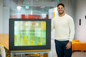 Harvard SEAS student Brice Austin with a liquid-filled window