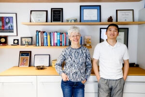 Susan Murphy and Ziping Xu standing in Susan's office