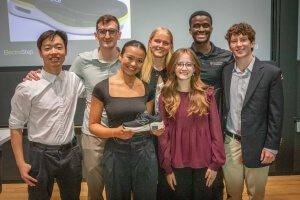 Harvard SEAS students Jerry Li, Viktor Bokisch, Kiyana Gallagher, Josefina Biernacki, Leah Lourenco, Ashley Redhead and Andrew Morrissey holding a shoe