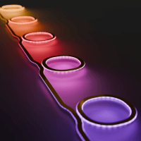 illustration of laser consisting of series of colored rings