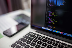 coding on a laptop